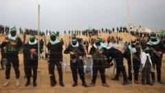 Die Hamas bei einer Geiselfreilassung (Bild: AFP)