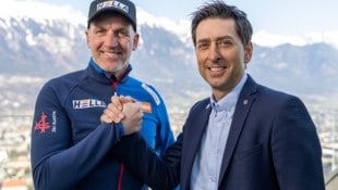 Biathlon-Sportdirektor Christoph Sumann (li.) mit ÖSV-Boss Mario Stecher. (Bild: APA/EXPA)